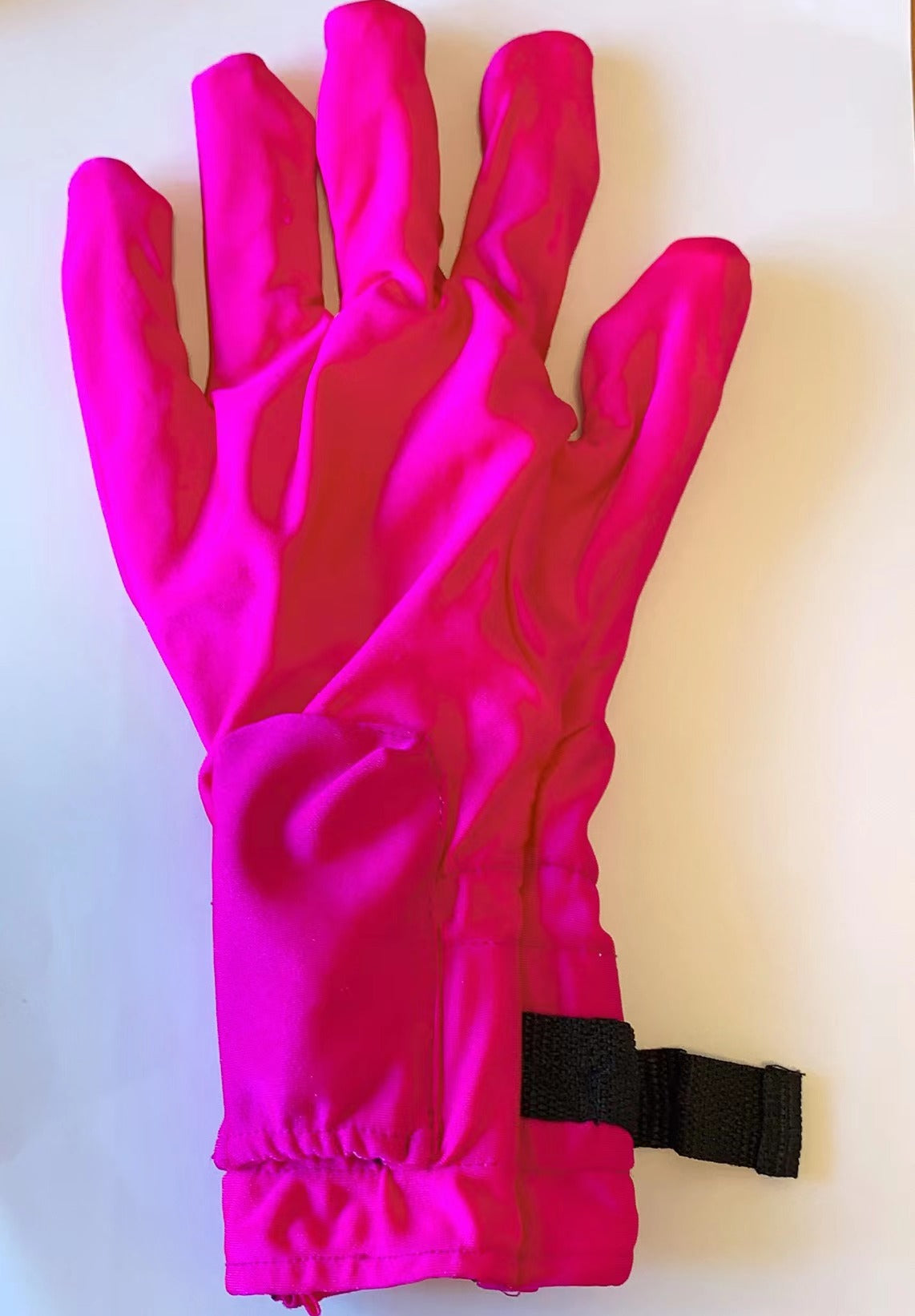 Massage glove with wrist strap